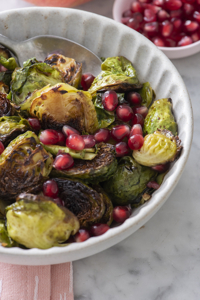 Cast Iron Brussels Sprouts with Pomegranate and Garlic from Weelicious.com